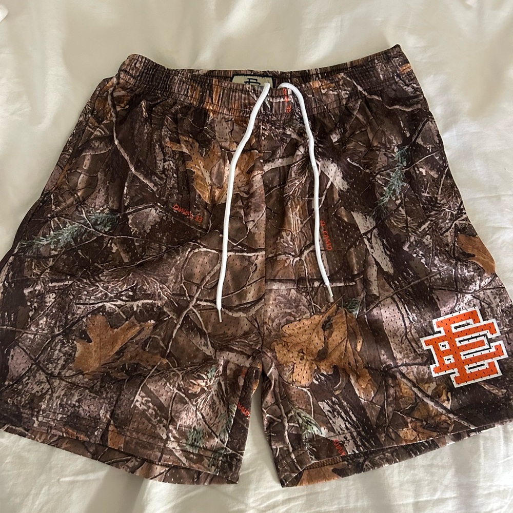 Eric Emanuel Orange Camo Athletic Shorts. Basketball and things of that nature
